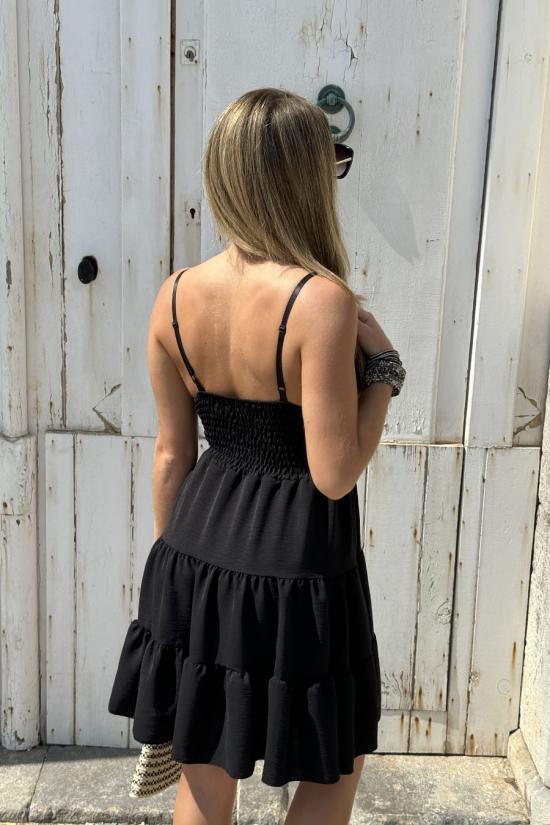 Short black dress with low...