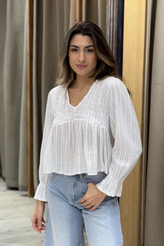 White flowing blouse