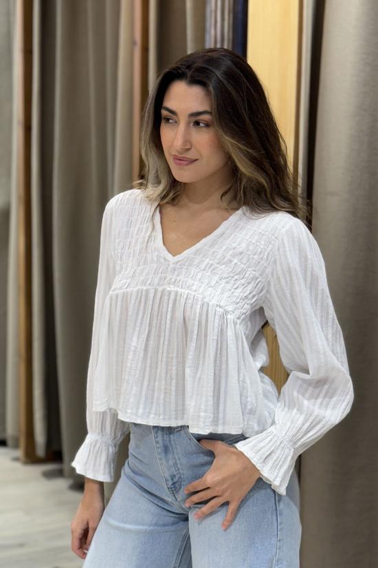 White flowing blouse