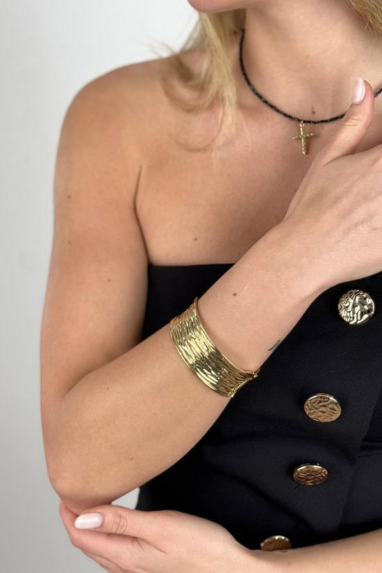 Pulsera metálica dorada